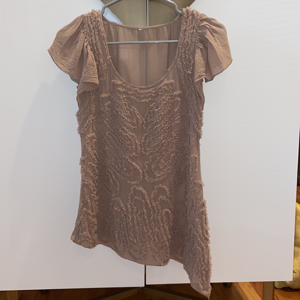 Asymmetrical neutral textured sheer top